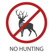 No Hunting Icon. Forbidding Sign In A Simple Flat Style. Crossed Out Red Circle. Silhouette Of A Deer With A Circle Of Sight On The Chest. Vector Illustration For Design And Web Isolated.
