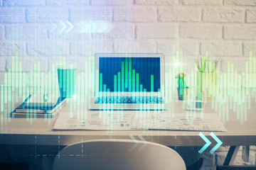 Financial market graph hologram and personal computer on background. Double exposure. Concept of forex.