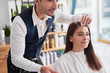 © gpointstudio - Woman and hairdresser choosing of color to hair dye