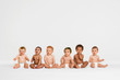 © MDBPIXS - A group of mult ethnic babies sitting in a studio