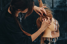 Training Hair Styling On A Mannequin