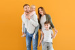 Leinwandbild Motiv Portrait of happy family on color background
