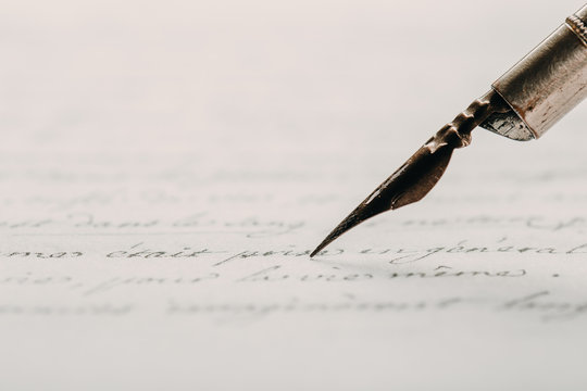 Fountain pen on an ancient handwritten letter. Old story. Retro style.