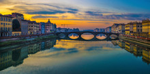 Florence, Ponte Alla Carraia Medieval Bridge Landmark On Arno River At Sunset. Tuscany, Italy.