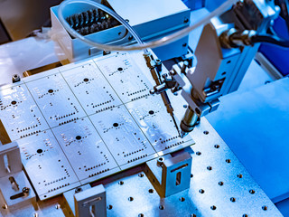Poster - PCB. Automated soldering. Equipment for the manufacture of PCB. Robot for automatic soldering PCB. Microchips manufacturing. Equipment for the production of microchips. Production of computer parts