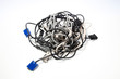 © moodboard - Tangled cables over white background