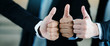 © Rapeepat - Close up of Hands the business people with three thumbs up Is working as a team work that helps the work achieve its goals The acquisition of a business partner Honest work. Concept Positive thinking