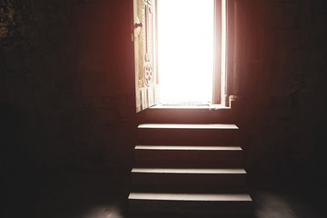 Poster - Light entering through open door in church