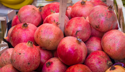 Wall Mural - stack of fresh red pomegranates 