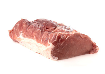 A piece of meat on a white background. Raw piece of pork close-up.