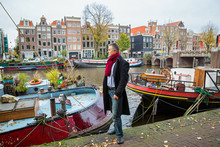 Man Travels And Walks Along The Amsterdam