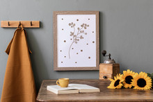 Scandinavian Interior Of Kitchen Space With Wooden Table, Brown Mock Up Photo Frame, Sunflowers, Book, Cup Of Coffee And Kitchen Accessories. Template, Ready To Use. Cozy Home Decor.
