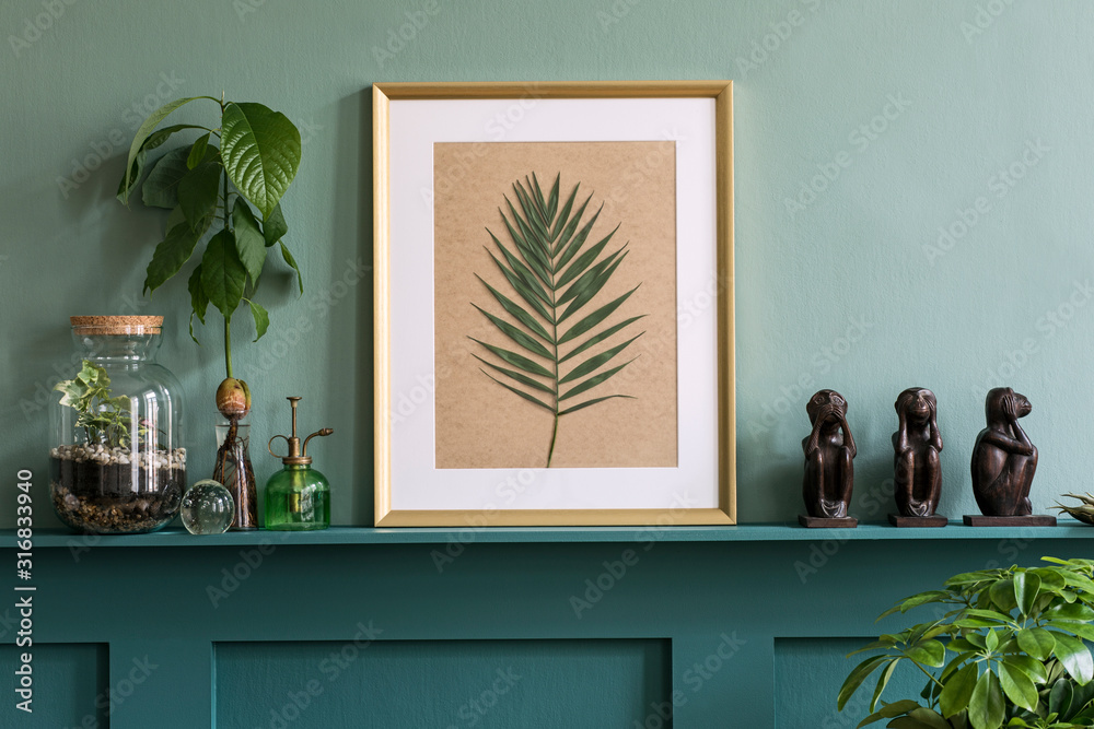 Interior design of living room with mock up photo frame on the green shelf with beautiful plants in different hipster and design pots. Elegant personal accessories. Home gardening. Template.  - obrazy, fototapety, plakaty 