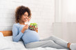 Pregnancy meal plan. African-american woman eating fresh vegetable salad