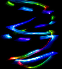 Wall Mural - Abstract color pattern of luminous stripes on a black background, bright and smooth color streaks