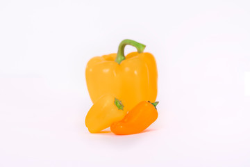 Small orange peppers with an orange bell pepper