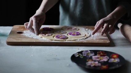 Wall Mural - Woman making cookies with Primula petals