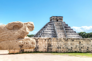 Wall Mural - Ancient Serpent Scultpure With Pyramid of Kukulcan at Chichen Itza