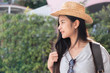 © weedezign - Asian woman traveler backpacker looking for route of place on street in when travel in city,journey trip