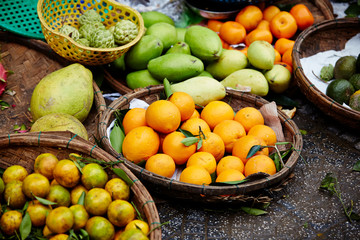 Canvas Print - Tangerine at Asian fruit market 