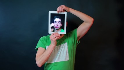 Poster - Manikin is holding a tablet screen in his hands.