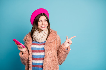 Poster - Portrait of her she nice-looking attractive lovely pretty cheerful cheery girl pointing aside copy space ad advert isolated on bright vivid shine vibrant green blue turquoise color background