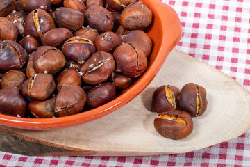 Wall Mural - traditional portuguese dish of roasted chestnuts