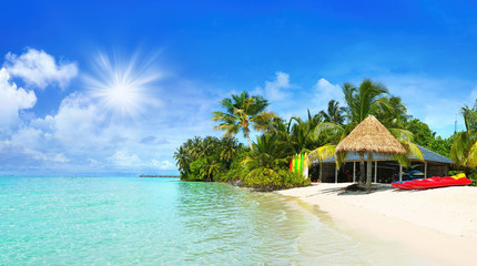 Wall Mural - beautiful beach with white sand, turquoise ocean and blue sky with clouds on sunny day. summer tropi