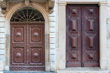 two old wooden doors trimmed with metal decorations from different cities of Europe