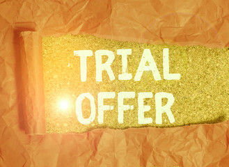 Aufkleber - Handwriting text Trial Offer. Conceptual photo A temporary free or discounted offer of a product or services Cardboard which is torn in the middle placed above a wooden classic table
