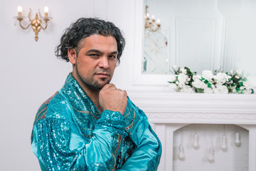 portrait of a brooding male dancer in Gypsy costume