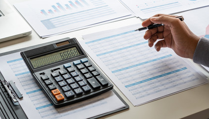 Poster - businessman working calculate data document graph chart report marketing research development  planning management strategy analysis financial accounting. Business office concept.