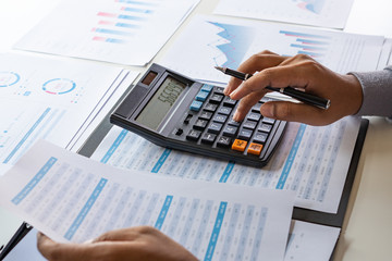 Poster - businessman working calculate data document graph chart report marketing research development planni