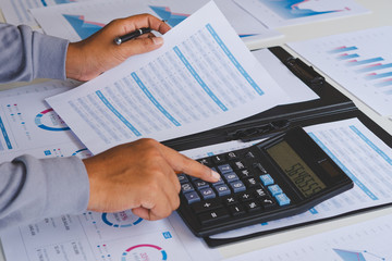 Poster - businessman working calculate data document graph chart report marketing research development planni