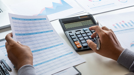 Poster - businessman working calculate data document graph chart report marketing research development planni