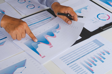 Poster - businessman working calculate data document graph chart report marketing research development planni