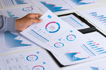 Poster - businessman working calculate data document graph chart report marketing research development planni