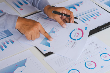 Poster - businessman working calculate data document graph chart report marketing research development planni
