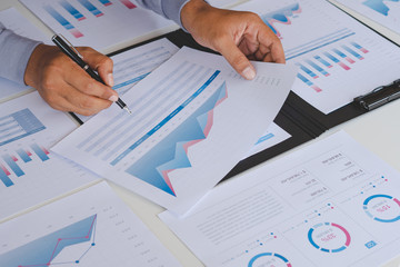 Poster - businessman working calculate data document graph chart report marketing research development planni
