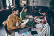 © deagreez - Casual style clothing wearing people ceo collars sit table desk analyze start-up training development progress report read use write notes notebook clipboard in office workstation