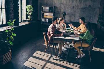 Poster - Focused serious professional freelancer sit table desk analyze start-up development innovation progress project talk say speak tell smart ideas in workplace dark sunny office