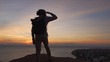 © Alexander Belinskiy - handsome middle eastern male standing on a cliff and looking ahead
