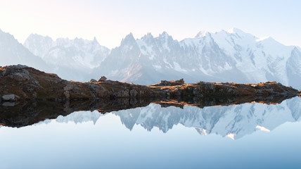 panorama of chesery lake (lac de cheserys) and snowy monte bianco mountains range on background, cha