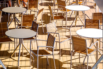 Poster - table and chairs at a cafe