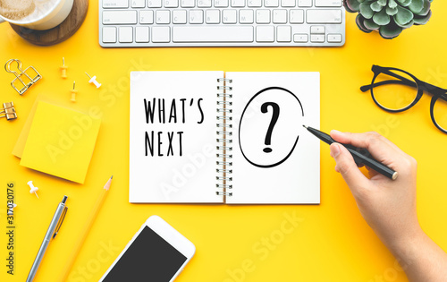 Fotografía Business inspiration concepts with woman writing What's next? text on papernote