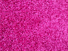 Soft And Warm Fluffy Carpet Rug In Pink Color Made Of Natural Wool Used In Interior Decoration Design Of The Floors