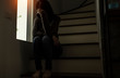 Sad young woman sitting at the home, People with depression concept