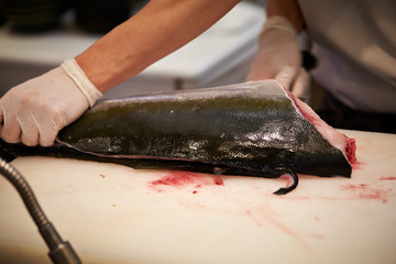 Poster - Filleting fish at fish market 