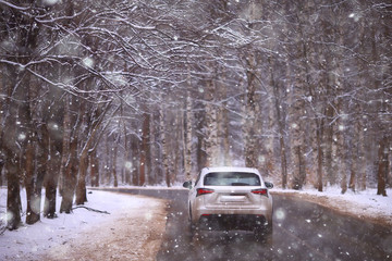 Poster - view of the winter road from the car, traffic in the seasonal city, bad weather in the northern city