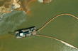 A dredger working in the quarry for sand mining. Aerial view